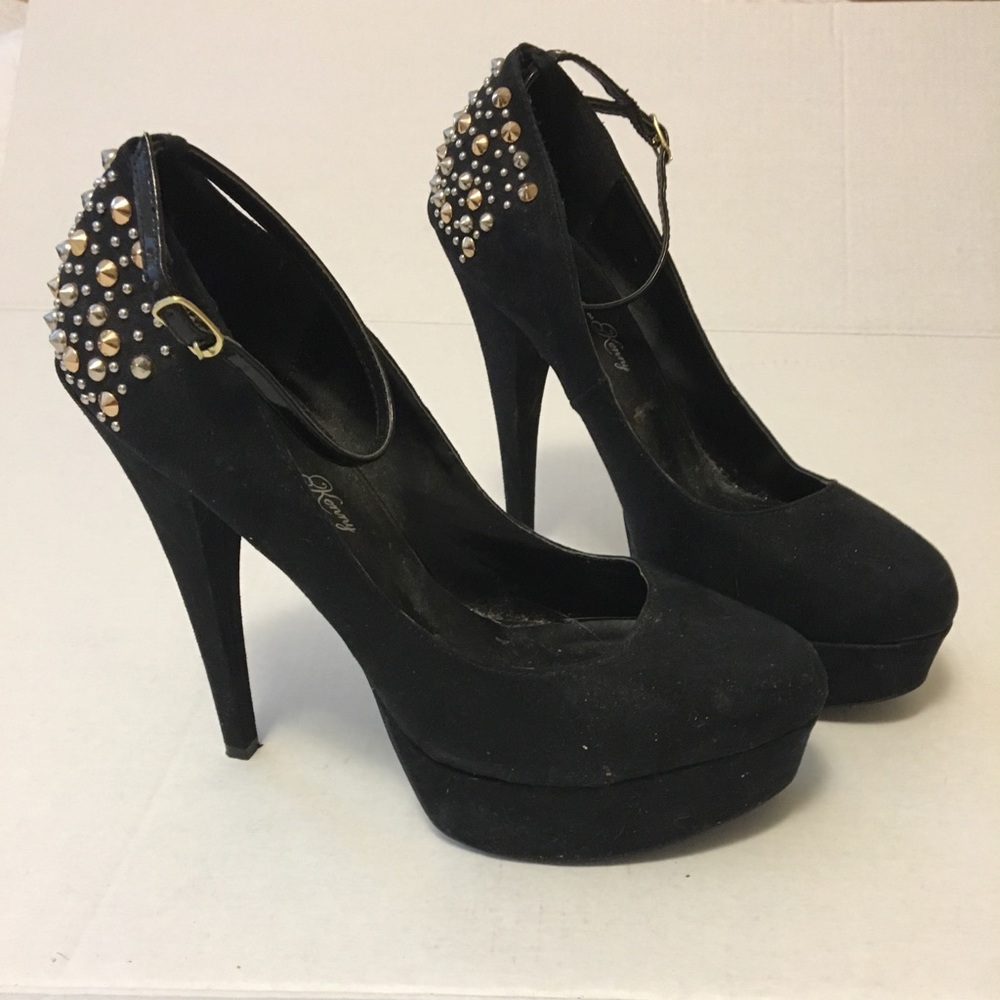 Black suede pumps with metallic heel